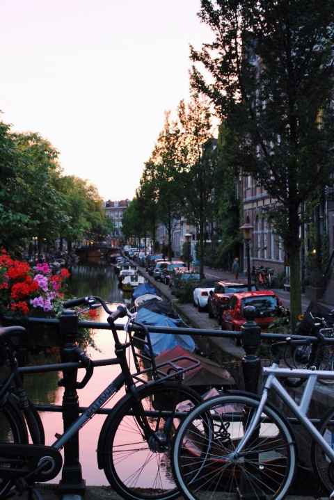 Canal Amsterdam travel bike